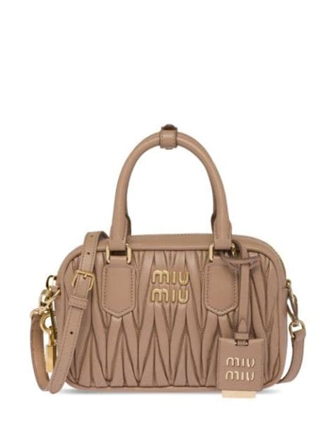 borsa miu miu prezzo|Scopri la nuova collezione di borse Miu Miu donna su FARFETCH.